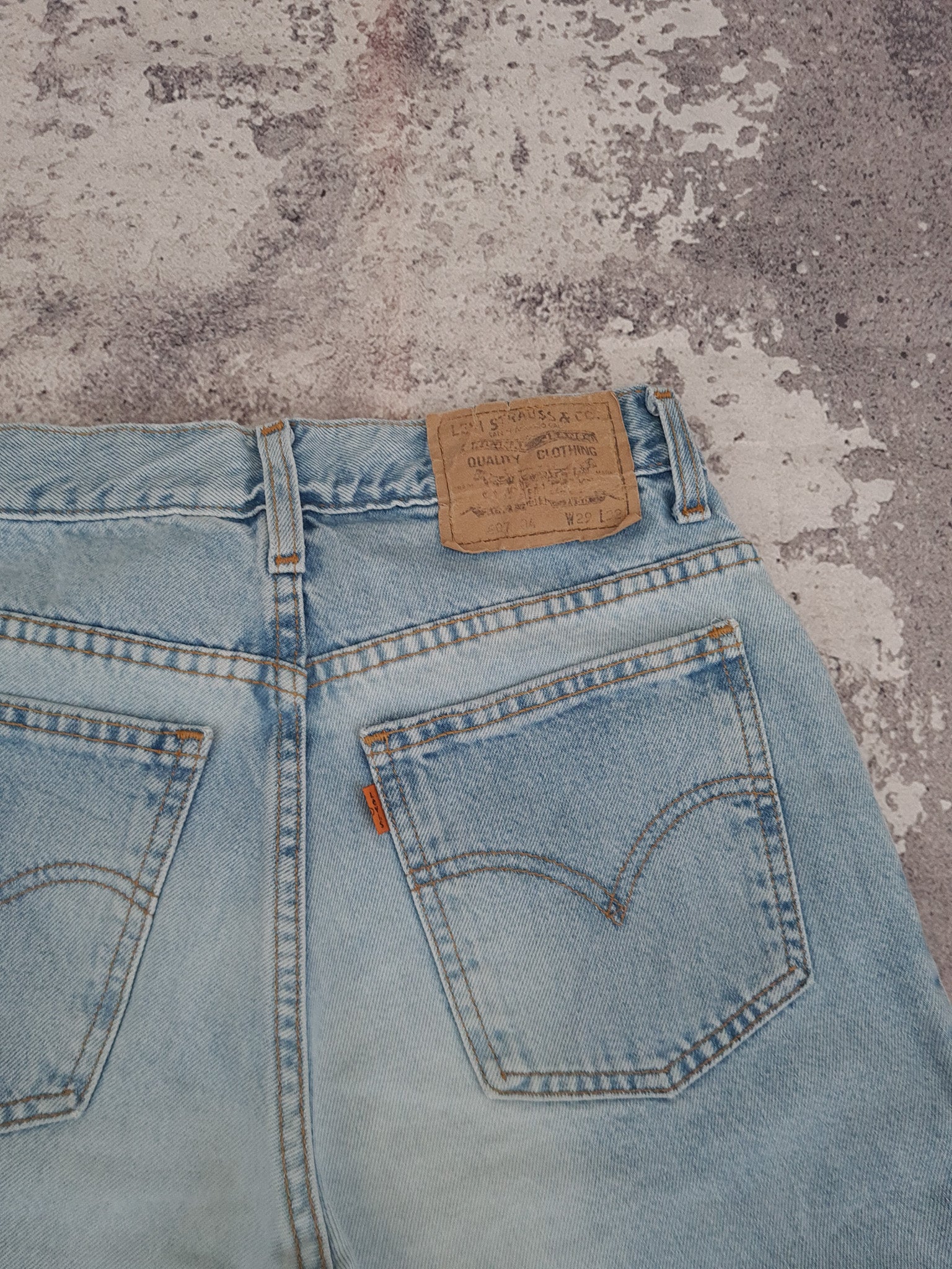 Levis 607 shop orange tab